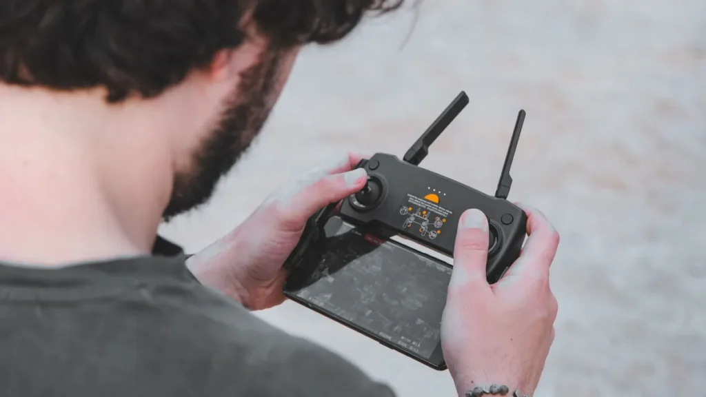 RPOC Inspection: 9 Critical Things Transport Canada Checks 2 Drone pilot at the controller, the flights whose records an RPOC inspection compares against the operations manual