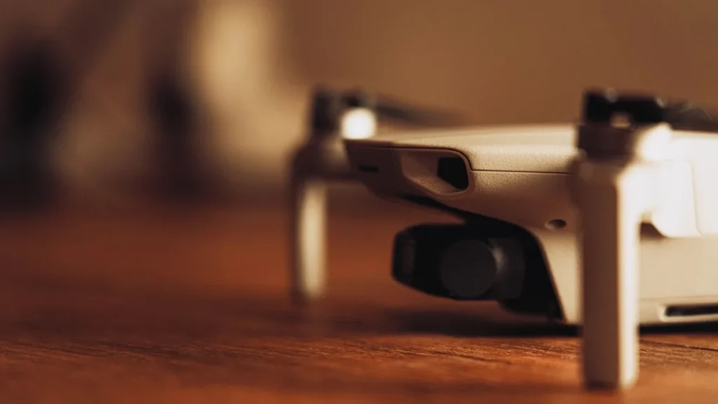 Learn How to Fly a Drone: 5 Proven Habits for a Safe Start 2 Drone on a table during pre-flight setup, firmware update and compass calibration before a first flight